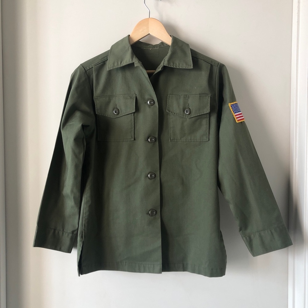 Vintage army jacket with patches